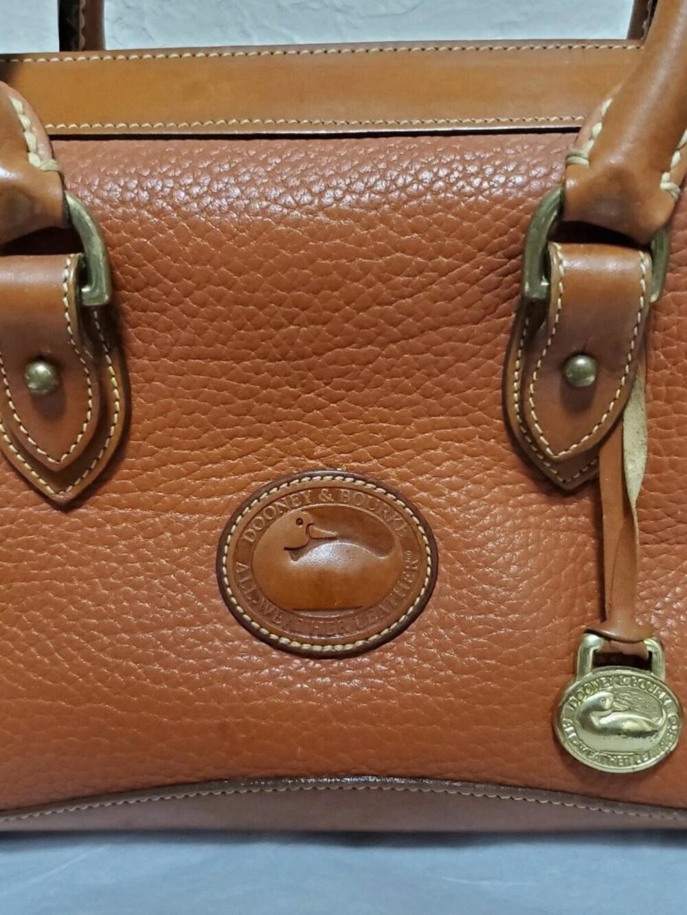 Dooney And Bourke Pebbled Leather Peanut Color Crossbody Handbag - Picture 2 of 10